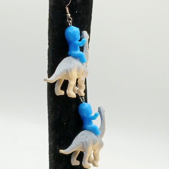 Hypoallergenic Baby Riding Dinosaur Dangle Earrings - Spencer's - Picture 3 of 3